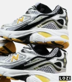 کفش کتانی مردانه و زنانه طوسی مشکی خردلی NEW BALANCE 1064 V.2 مدل 6664 - Image 3