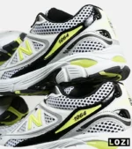 کفش کتانی مردانه و زنانه سفید مشکی لیمویی NEW BALANCE 1064 V.2 مدل 7010 - Image 3
