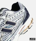 کفش کتانی مردانه و زنانه سفید سرمه ای NEW BALANCE 1064 مدل 8150 - Image 7